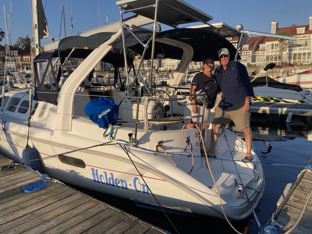 Glenn and Kathy next to S/V Holden On during one of their many adventures.