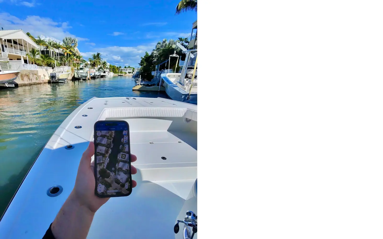 A smartphone displaying the Argo boating navigation app is held on a boat traveling through a calm canal with homes and docked boats.