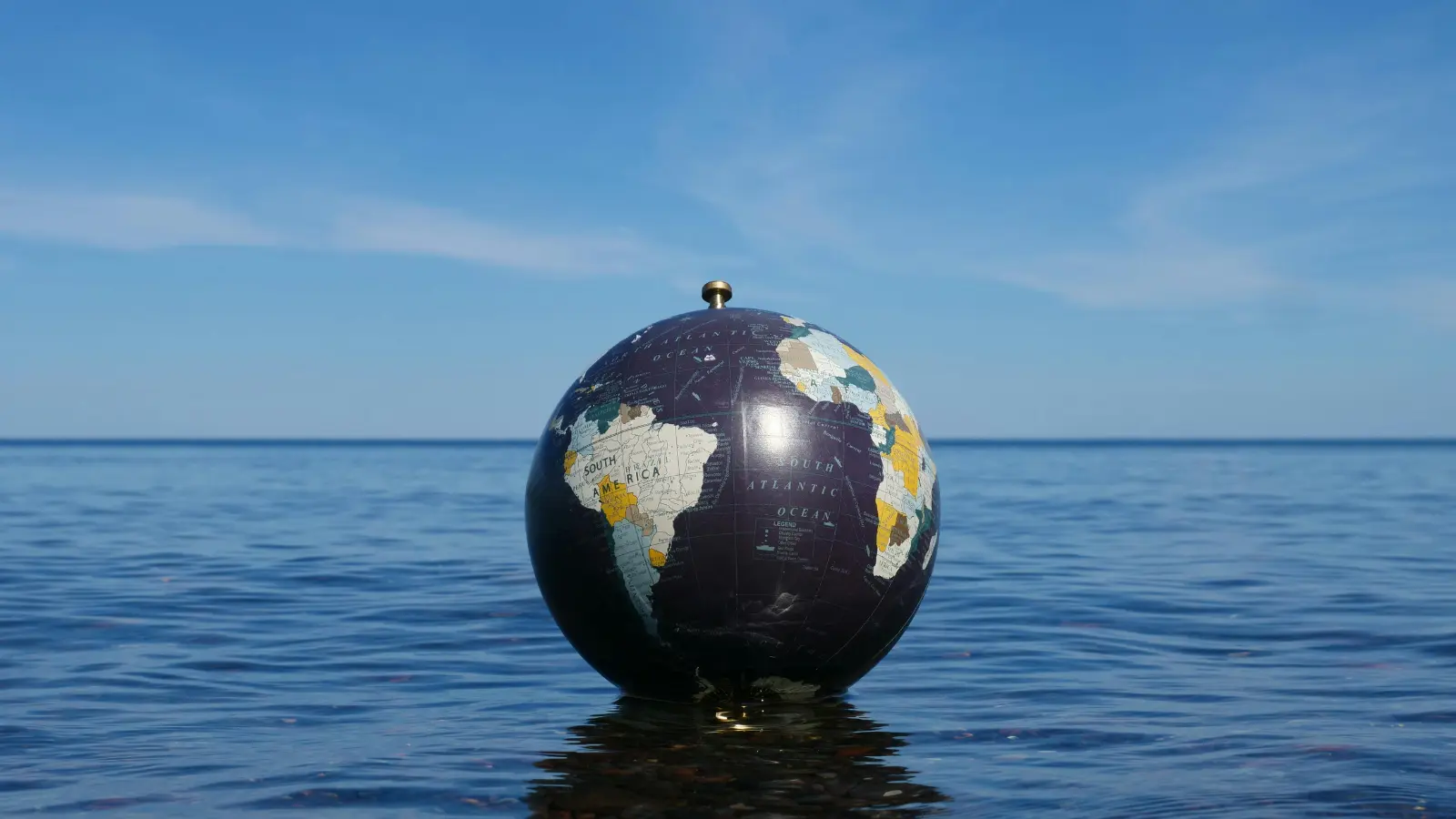 Globe floating on the ocean