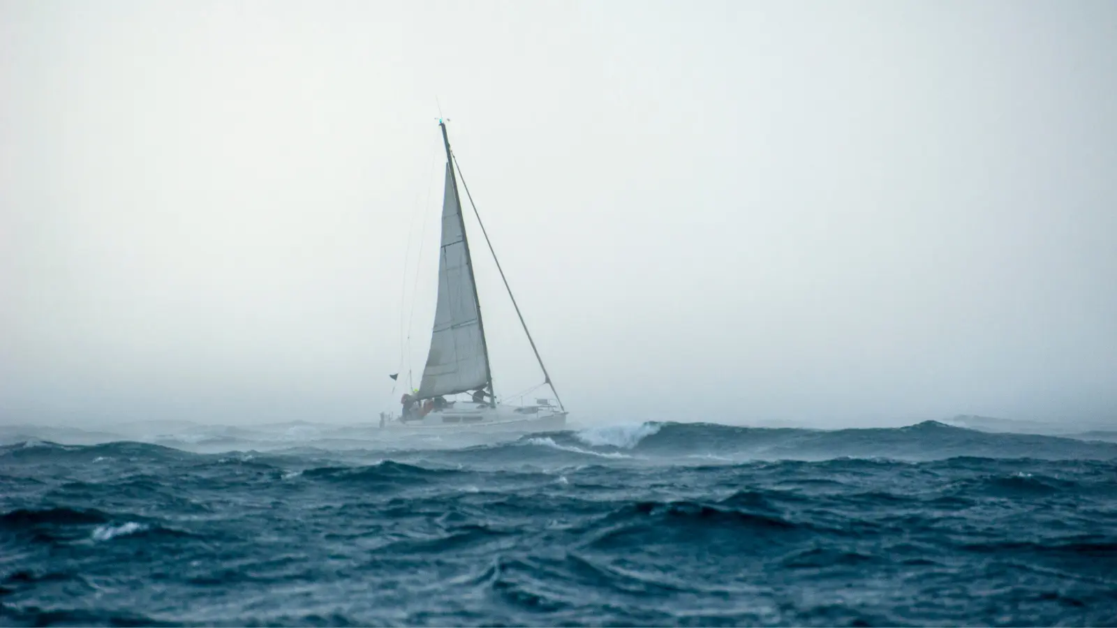 Sailboat on stormy water