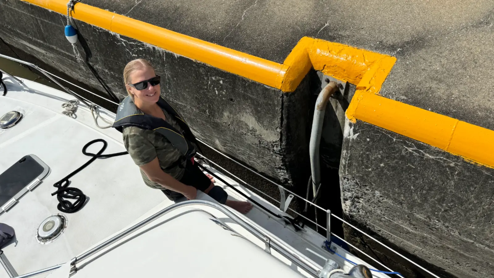 Stacey Guth helping with boat