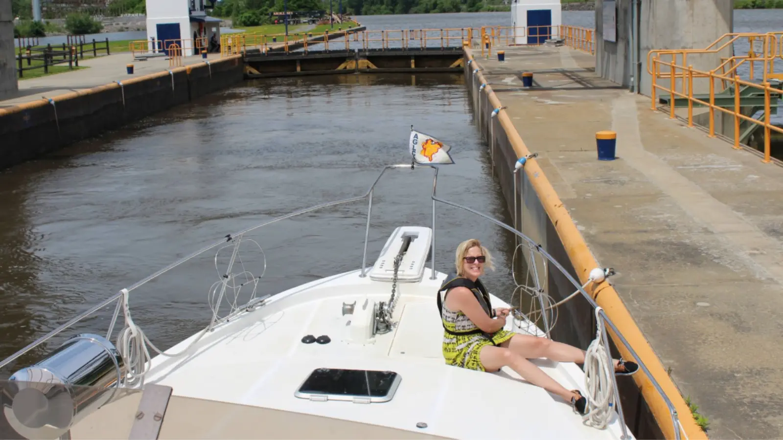 Stacey Guth sitting on a boat